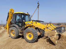 Экскаватор-погрузчик с гидромолотом JCB4CX