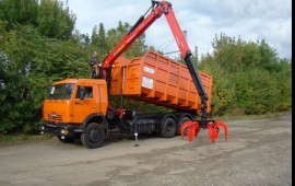 Вывоз мусора с погрузкой 24 м3 за рейс
