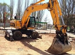 Услуги, аренда, заказ колесного экскаватора в "Ижевске"