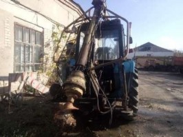 Бурильно-крановая машина бм-205В на тракторе мтз