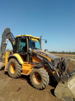 Аренда экскаватора-погрузчика New Holland в Лесколово