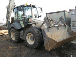 Аренда экскаватора-погрузчика Terex 990
