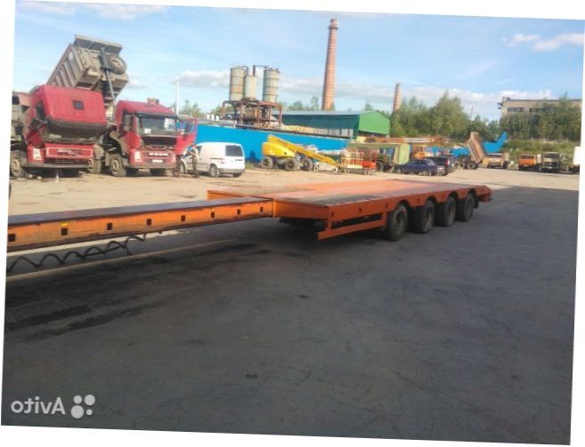 Перевозка строительной техники тралом Daf
