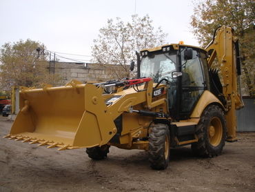 Аренда экскаватора-погрузчика с гидромолотом JCB, САТ